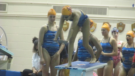 Itzayana Rodriguez '16 gets ready to dive in for a relay start during a meet last season. 