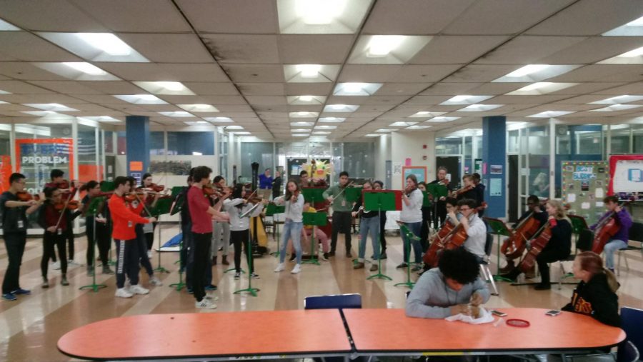 WYMHS Chamber Orchestra performing in lunchroom